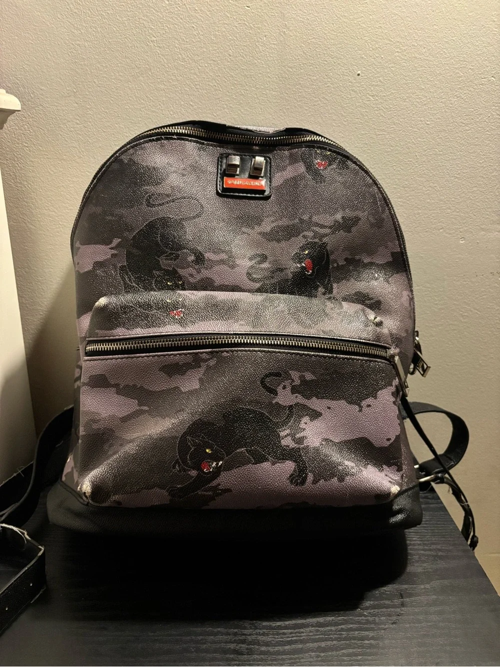 Sprayground Black and Purple Panther Print Backpack